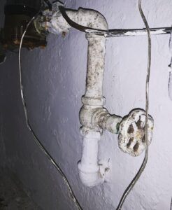 Old Water Meter Piping and Valve Setup Before Replacement
